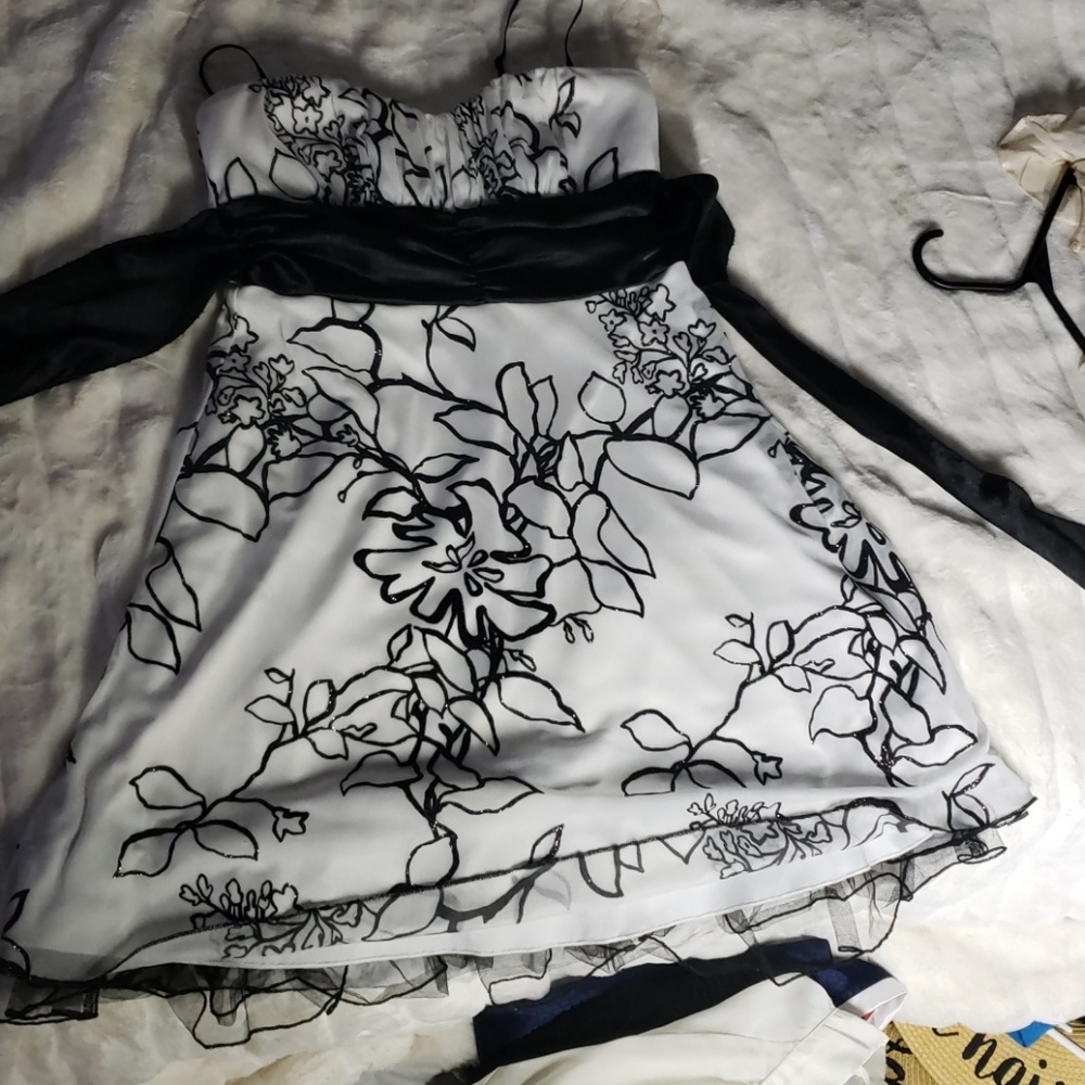 Large white and black speckless dress